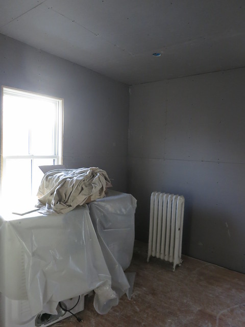 blue board in laundry/closet